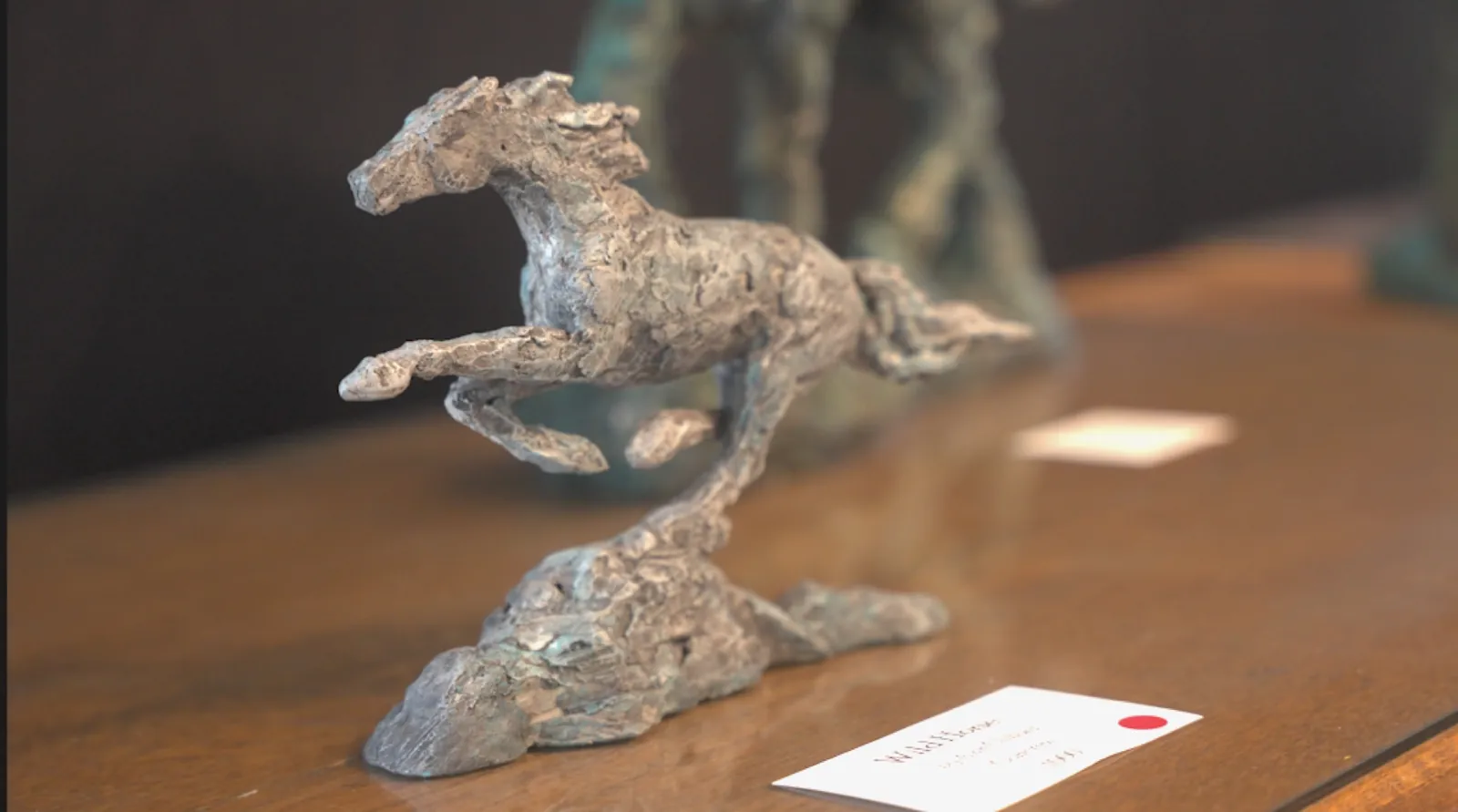 Close view of a small running horse sculpture