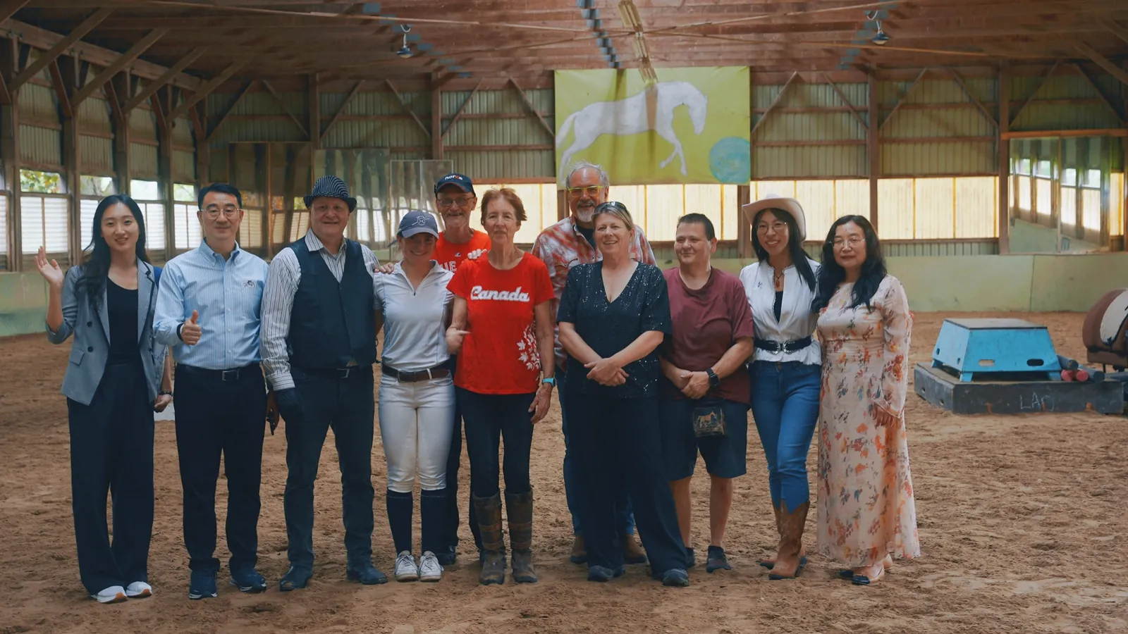 Artists and organizers posing after the equestrian program