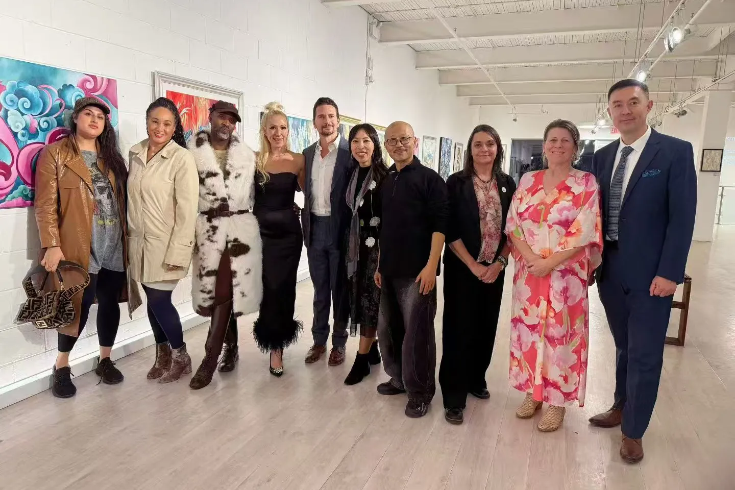 Artists, organizers, and guests gathered in the gallery